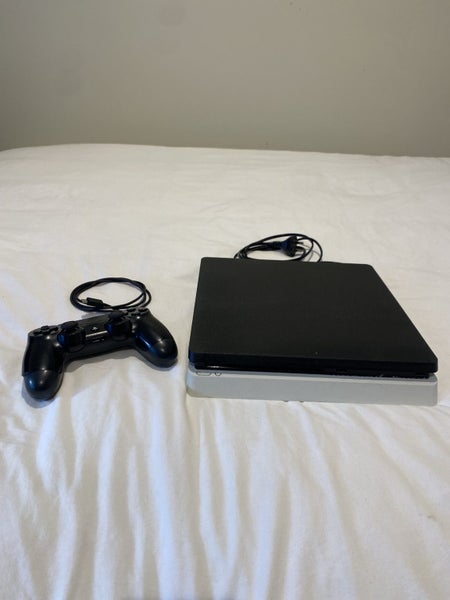 PS4 Console. Controller. Power Cord and Charge Cable Carousel 1
