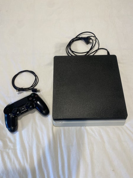 PS4 Console. Controller. Power Cord and Charge Cable Carousel 2