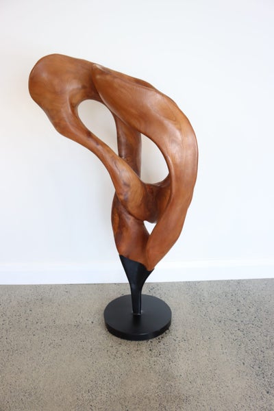 “Solace in Motion” – Hand-Carved Mahogany Sculpture63617320574465112