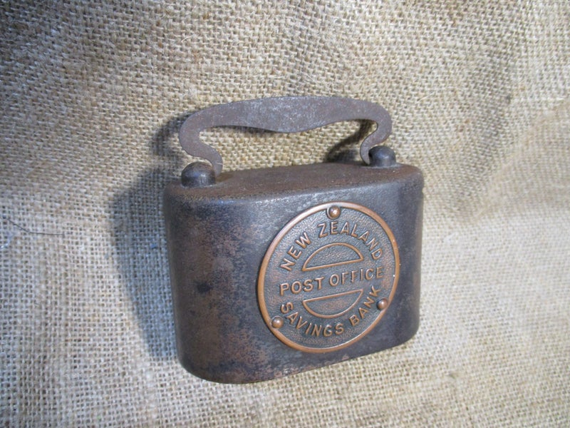 Vintage New Zealand Post Office savings bank. Made by Fiscus ltd. (no. 32824). Carousel 1