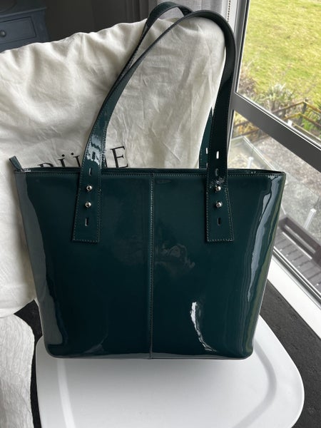 Argentinian designer: Green patent tote and clutch $600+63617615497986113