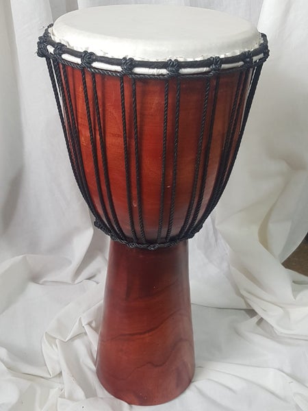 Djembe. Beautiful wood. well made. Good quality. Sounds great. 26 cm diam. X 58. Carousel 1