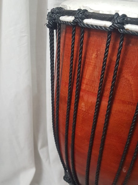 Djembe. Beautiful wood. well made. Good quality. Sounds great. 26 cm diam. X 58. Carousel 6