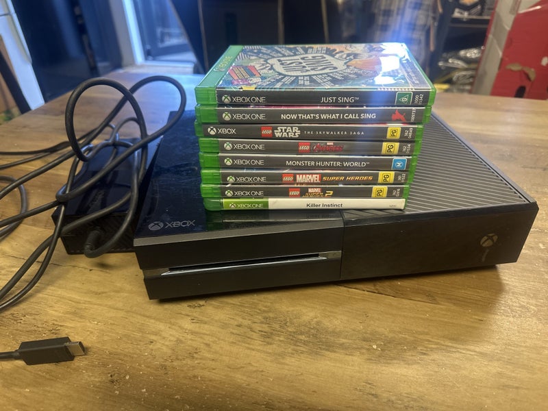 Xbox with console with games Carousel 1