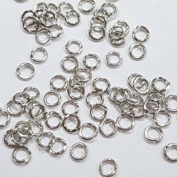 100pc 4mm Platinum Silver Jump Rings Carousel 1