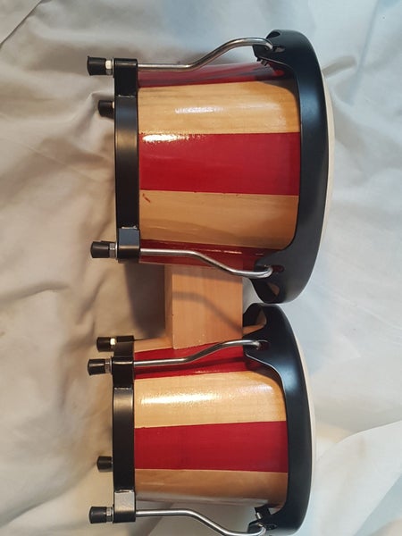 Bongos. 6 & 7 inches diameter. Sound great. new . good quality. Striped. Carousel 2