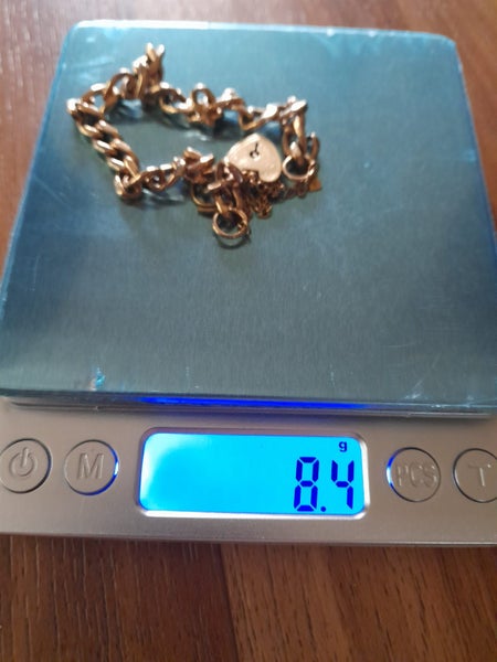 9 Ct Gold lock heart bracelet. Carousel 1