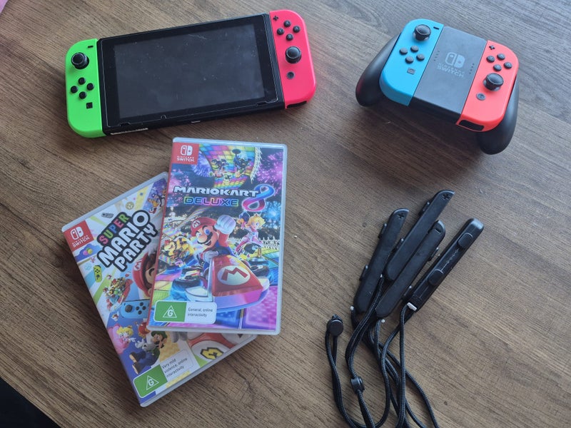 Nintendo Switch - Party Bundle - Console + Games + Joy-Cons Carousel 1