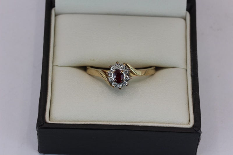 Vintage 9ct Ruby & Diamond ‘Halo’ ring Carousel 1