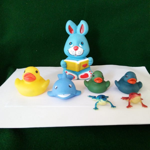 Seven Assorted Childrens toys Carousel 1