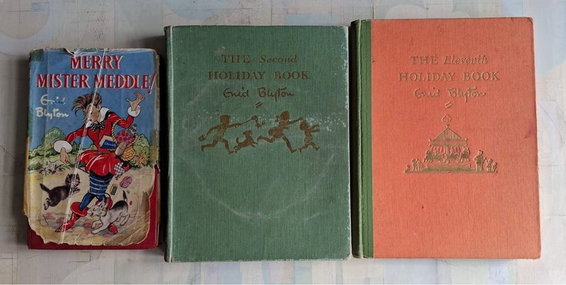 Enid Blyton hardback with dj and two Enid Blyton Holiday annuals Carousel 1