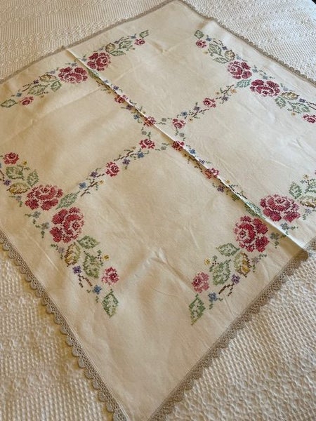 A lovely bright cross stitched linen Tablecloth with a hand embroidered edging Carousel 1