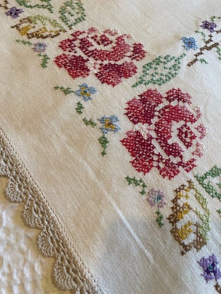A lovely bright cross stitched linen Tablecloth with a hand embroidered edging Carousel 2
