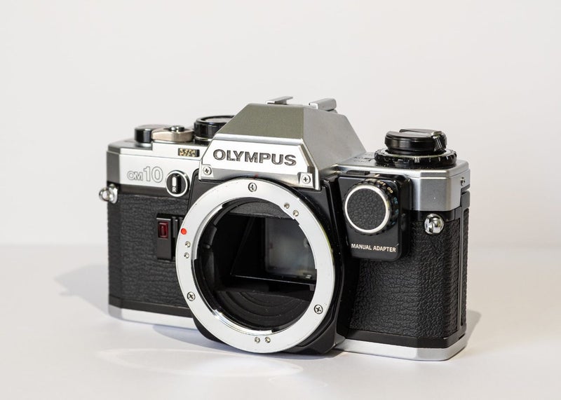 Olympus OM10 Body + Manual Adapter63801470032386110