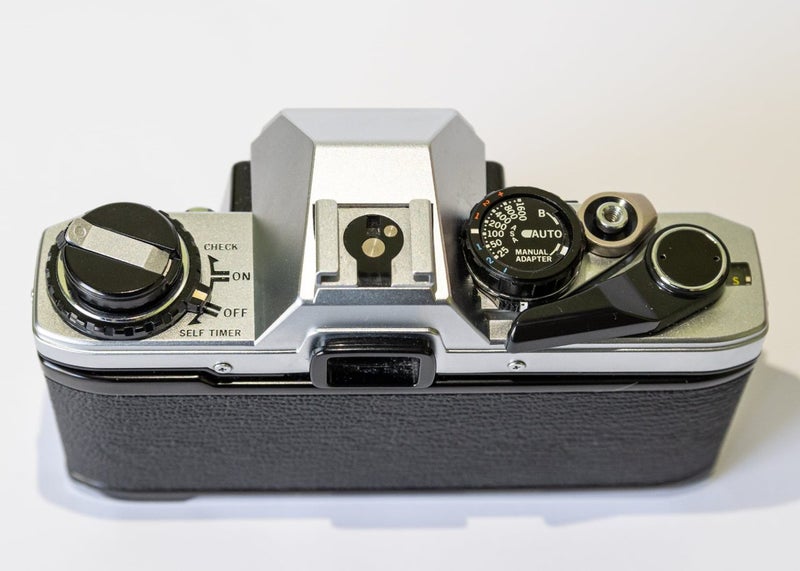 Olympus OM10 Body + Manual Adapter63801470032386114