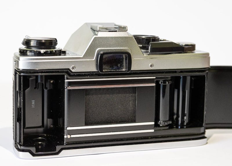 Olympus OM10 Body + Manual Adapter63801470032386113