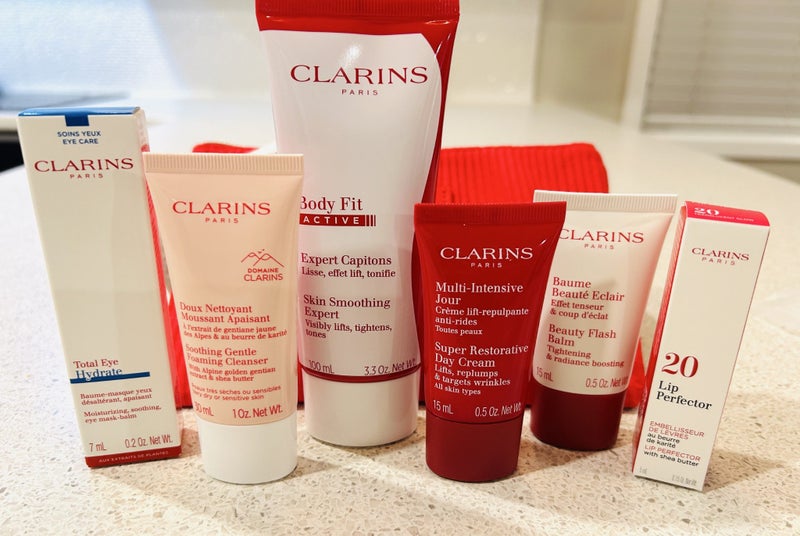 Clarins set with cosmetic bag Carousel 1