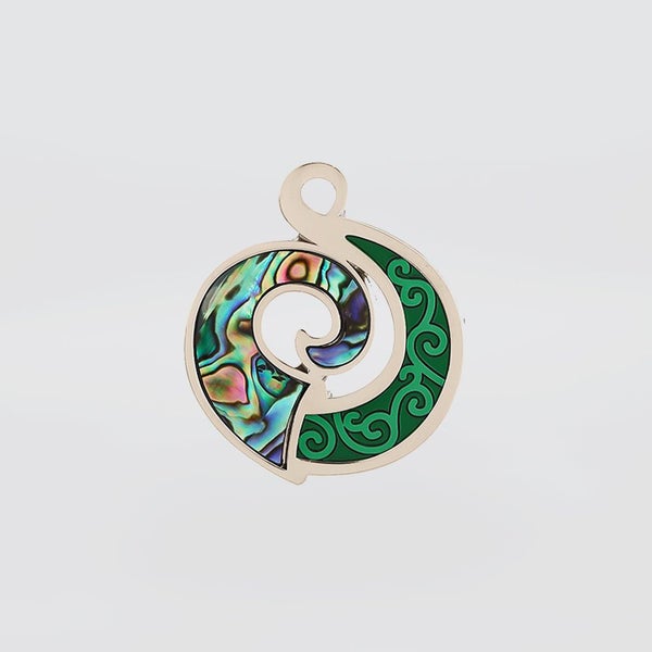 Koru Spiral Paua Magnet Carousel 1