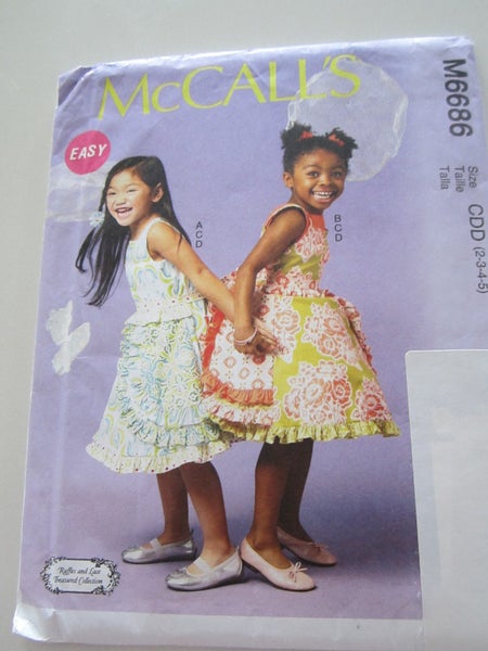 McCall's 6686 - Girls dresses, belt & petticoats - sizes 2, 3, 4, 5 years Carousel 1
