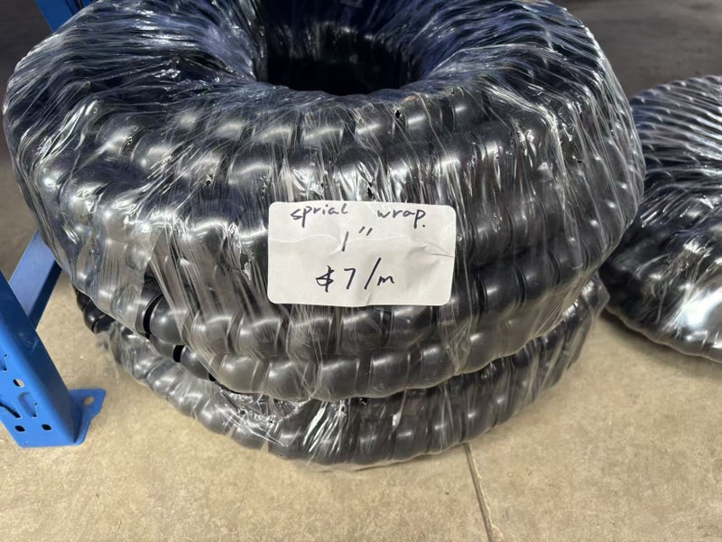 Spiral wrap for 1/4'' to 1'' hydraulic hose or other hoses.. Carousel 7
