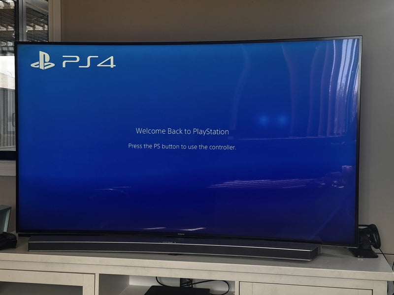 PlayStation 4 Slim 1TB + 2 Controllers + Dual Charging Dock Carousel 5