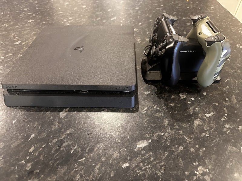 PlayStation 4 Slim 1TB + 2 Controllers + Dual Charging Dock Carousel 2