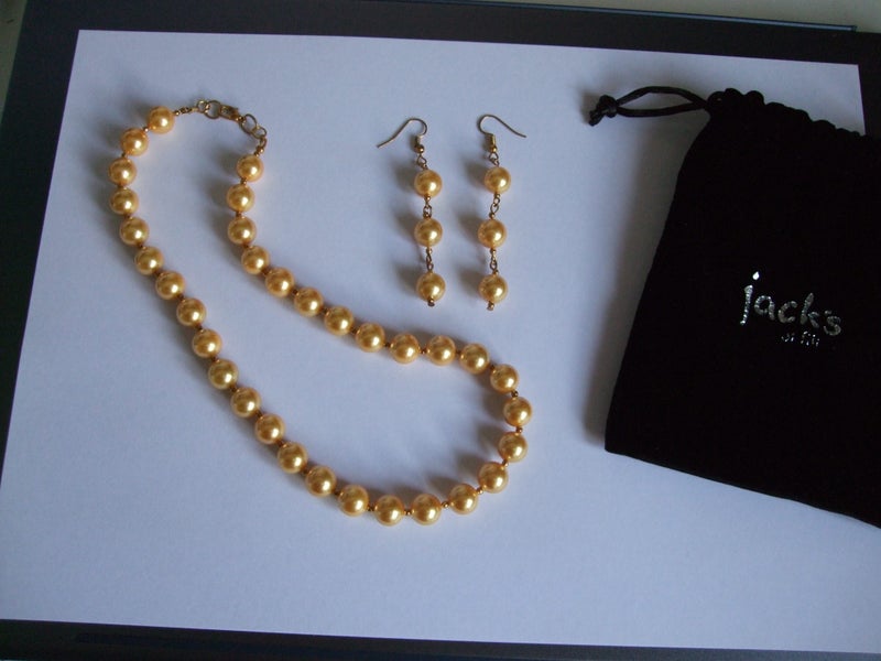 Beautiful Faux Pearl Necklace and Earrings Set in a Rich Gold Colour Carousel 1