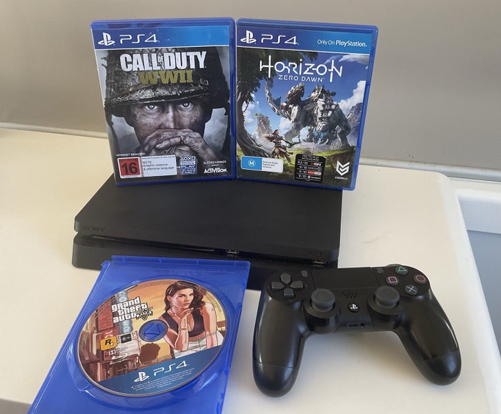 Playstation 4 - 1 TB Slim Package - GREAT GAMES GTA5 COD etc Carousel 1