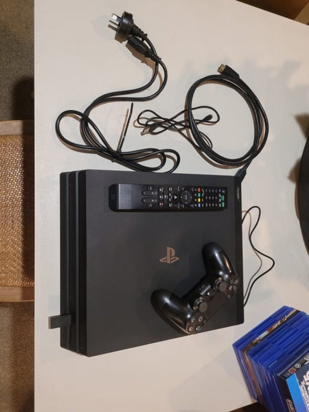PS4 Pro - 1TB with controller, remote, Dobe cooling63678503511553110