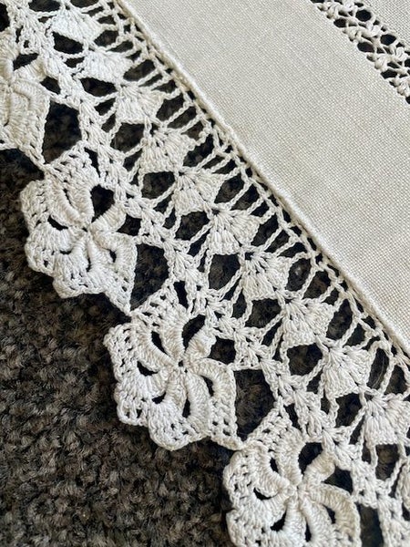 A beautiful very vintage white linen cloth with a deep hand crocheted edging Carousel 2