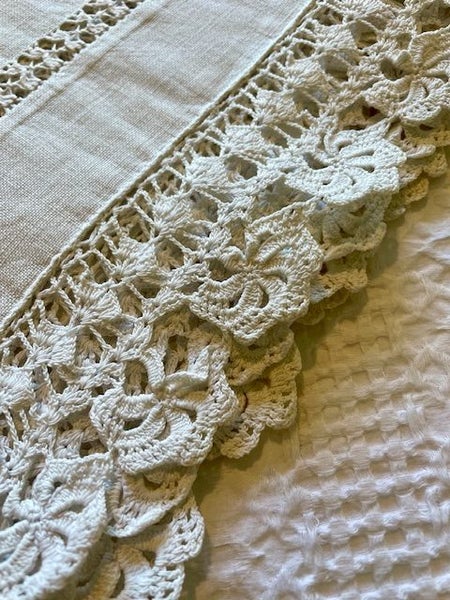 A beautiful very vintage white linen cloth with a deep hand crocheted edging Carousel 6