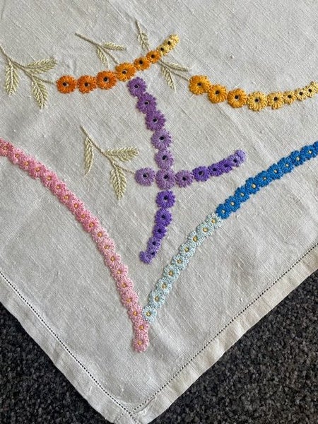 A lovely hand embroidered heavy slub linen vintage tablecloth Carousel 2