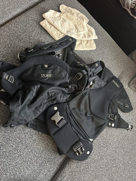 Stokke 3in1 baby carrier black with bib Carousel 1