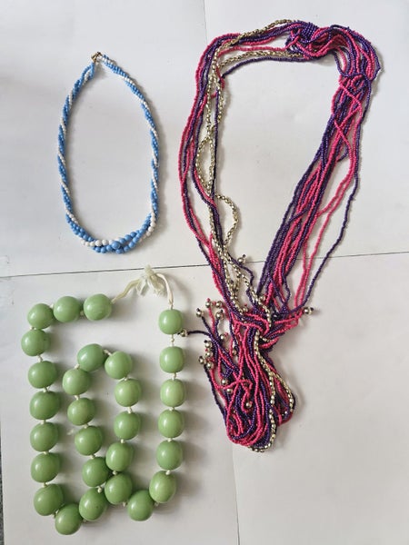 3 necklaces and Multiple beaded piece of Jewelry Carousel 4
