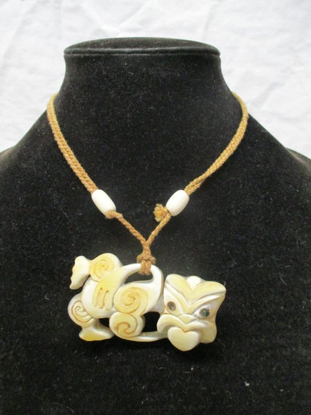PQ8 556 - Horn Carved Tiki - Paua Eyes - Adjustable Rope Necklace Carousel 1