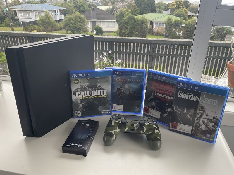 PS4 Bundle - Console + Controller + Games ….. **Immaculate Condition** Carousel 1