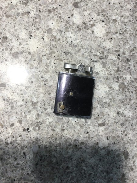 A RARE VINTAGE JAPANESE MUSICAL CIGARETTE LIGHTER Carousel 2