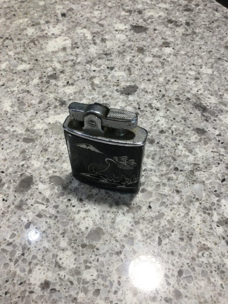 A RARE VINTAGE JAPANESE MUSICAL CIGARETTE LIGHTER Carousel 3