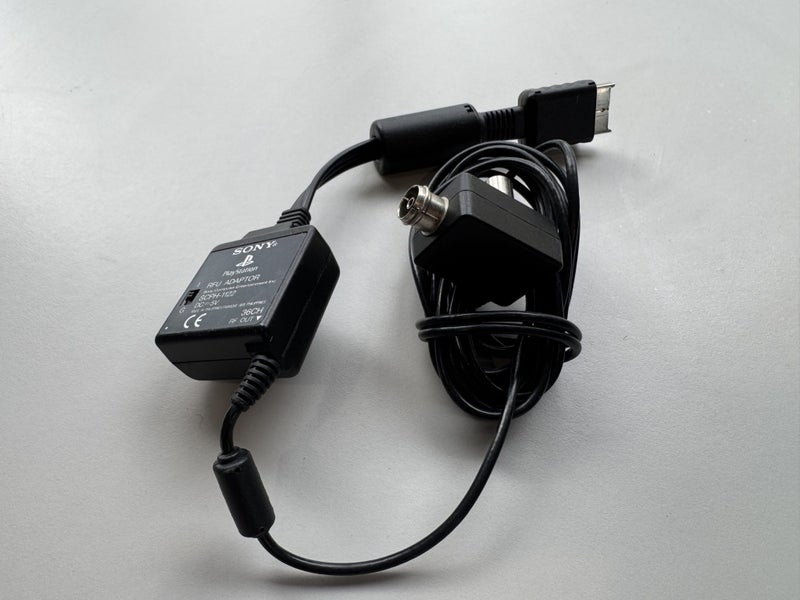 Sony PlayStation RFU Adaptor Carousel 1