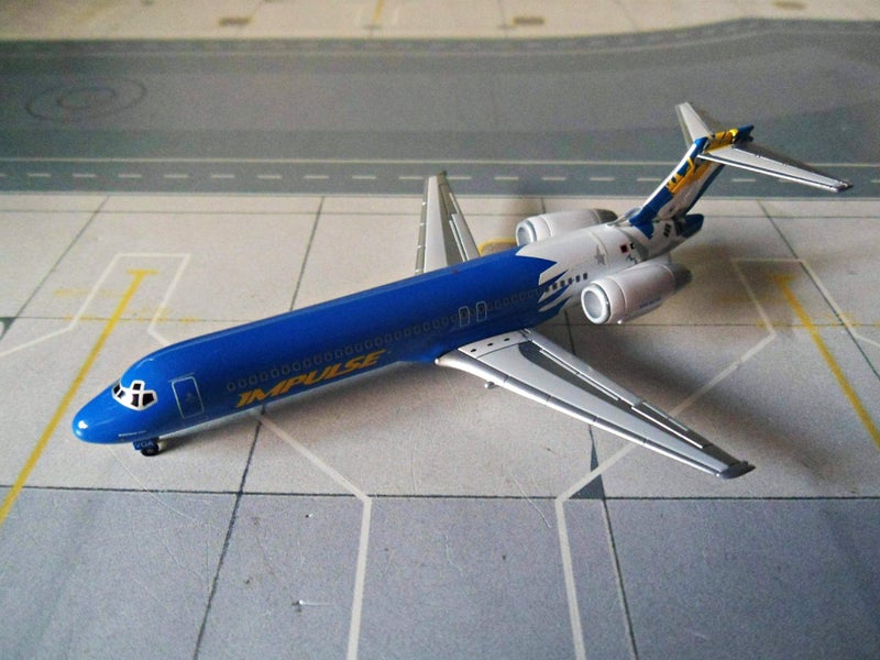 Scale 1/400 Dragon Wings - Boeing B717-200 Impulse Carousel 2