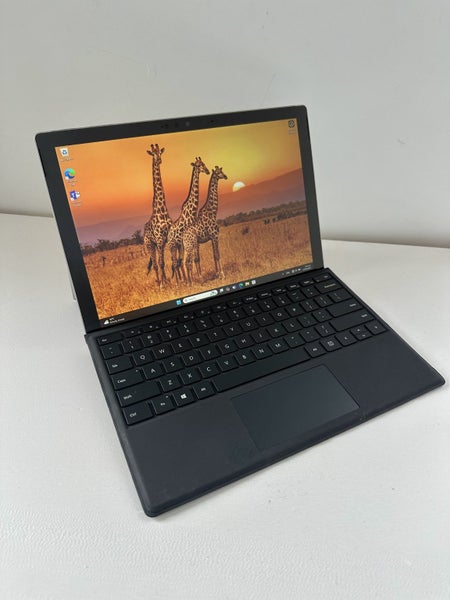 Surface Pro 7 with keyboard cover - i3 4GB RAM 128GB Win 11 Carousel 1
