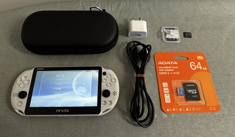 PS Vita – PCH-2000 | Glacier White | 64GB | Fully Set Up Carousel 1