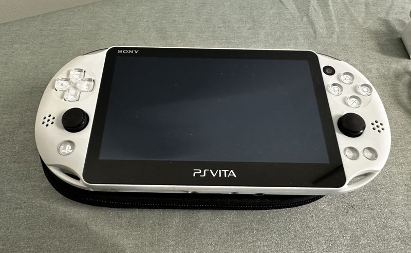 PS Vita – PCH-2000 | Glacier White | 64GB | Fully Set Up Carousel 2