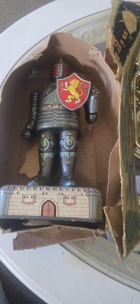 Vintage tin toy of knight in Armor Carousel 1