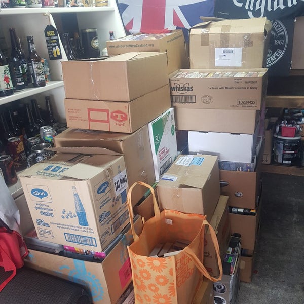 Boxes, boxes and boxes of VHS tapes. Assortment of genres from horrors to comedy Carousel 1