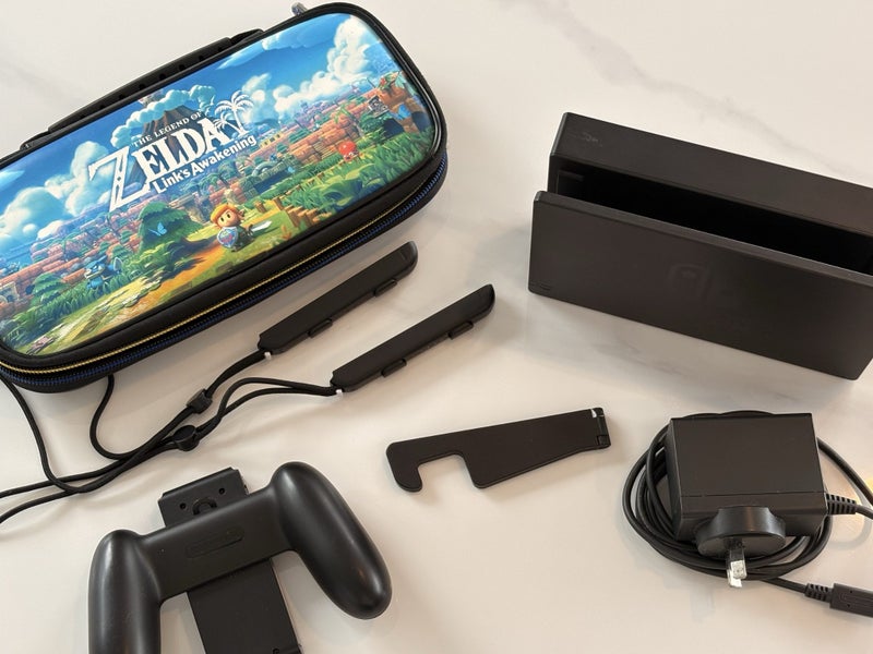 Lowered Price ! Nintendo Switch console With Carry Case Carousel 1