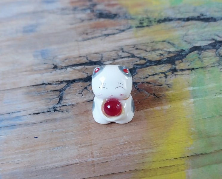 ***Tiny Treasures*** Cutie cat with red glass ball. Carousel 1