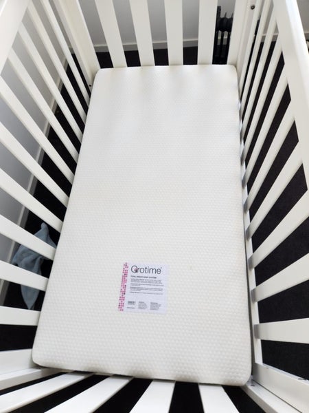 Cot, mattress and protector. Excellent condition. Carousel 3