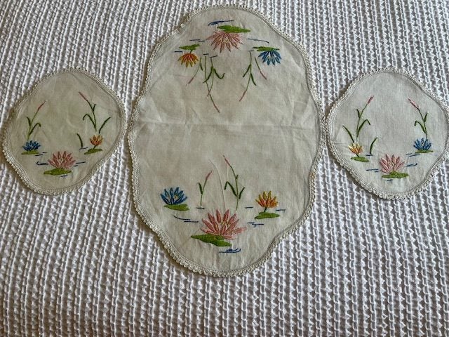 A gorgeous set of three hand embroidered vintage Linen DRESSER CLOTHS Carousel 1