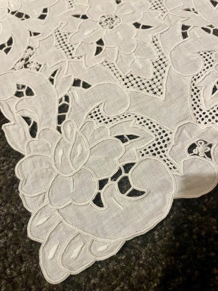 A lovely white worked linen Doily Carousel 2
